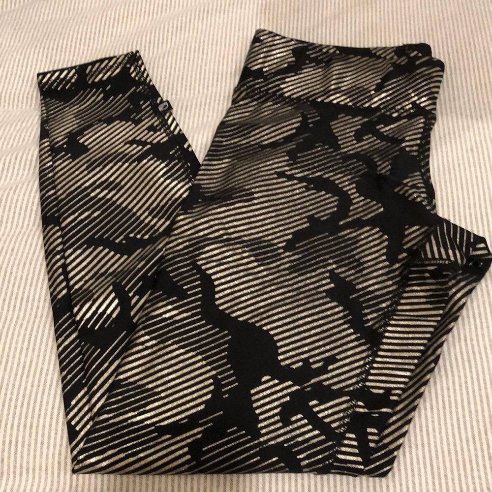 Terez black and gold foil camo leggings